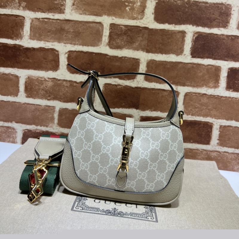 G*u*i top handle bags